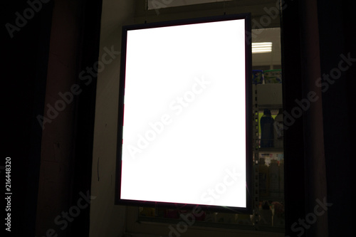 advertising glowing panel in the window of the shop mockup.
