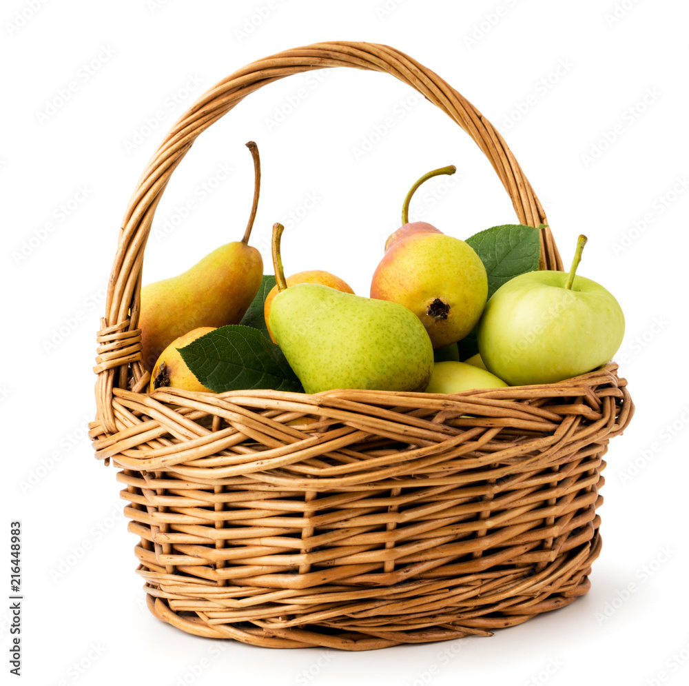 Basket with apples and pears on a white, close-up. Isolated.
