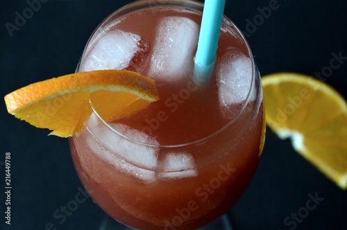 sex on the beach cocktail on dark background, top view