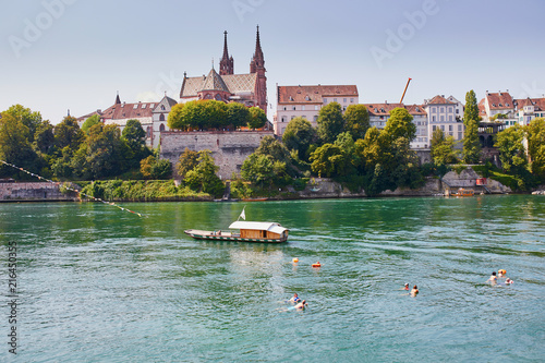 Fotografie, Tablou Scenic view of Rhine embankment with ferry boat in Basel, Switzerland