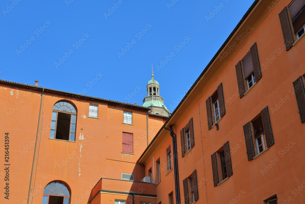 The building and architectural details on the streets of Bologna in Italy
