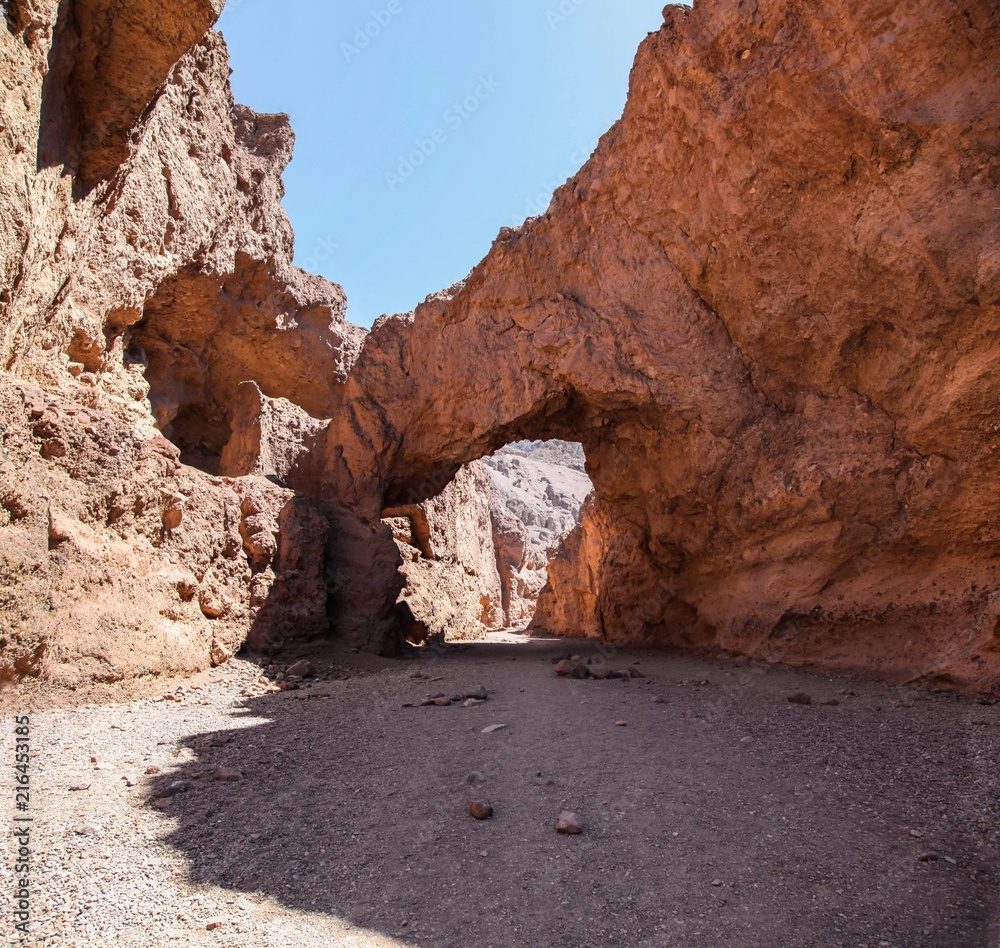 The arch rock formation of the Natural Bridge hiking trail in Death Valley National Park