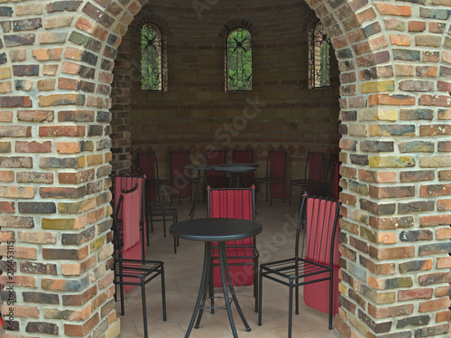 Bricks entrance into empty cafe with chairs and tables