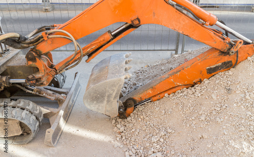 orange excavator photo