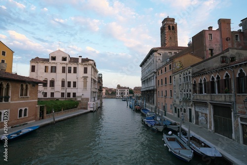 Venice,Italy-July 24, 2018 : Houses and shops near Guglie bridge on Cannaregio canal, Venice 