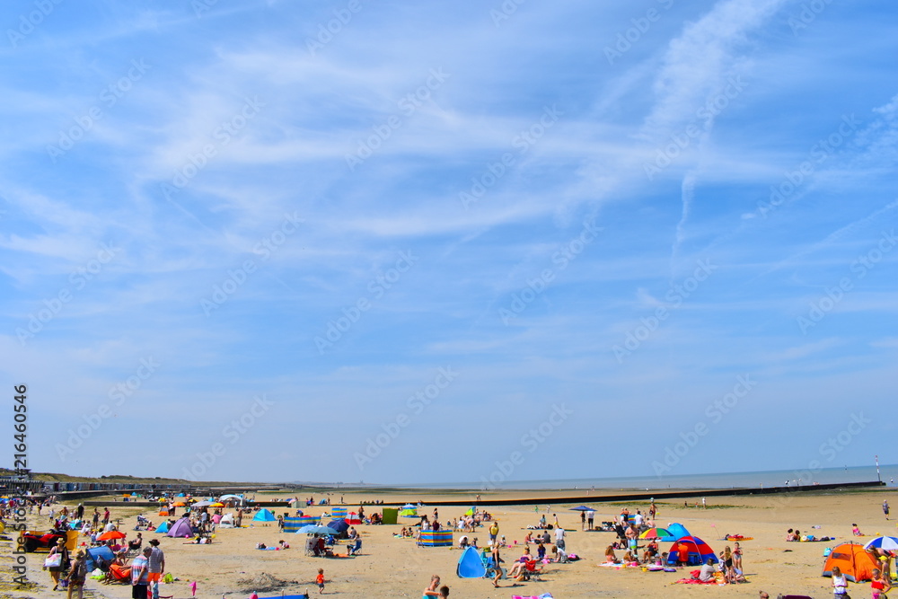 Beachgoers making the most of the sunshine at Minnis Bay over the weekend. Birchington, Kent, England