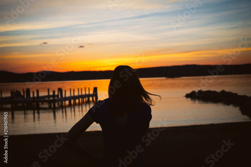 Sunset Silhouette At The Lake © James