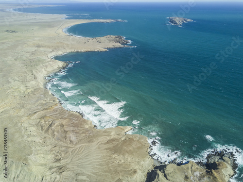 An aerial view of Atacama Desert at the coastal area at Chorrillos beach (Bahia Inglesa) an amazing landscape for geology with incredible sand formations and folds in the Earth, Copiapo, Chile