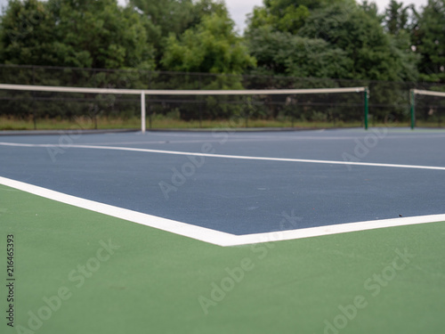 Tennis court bounds marker at a local small court, low angle view 
