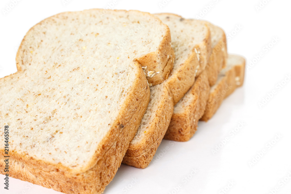 whole wheat bread on white background.