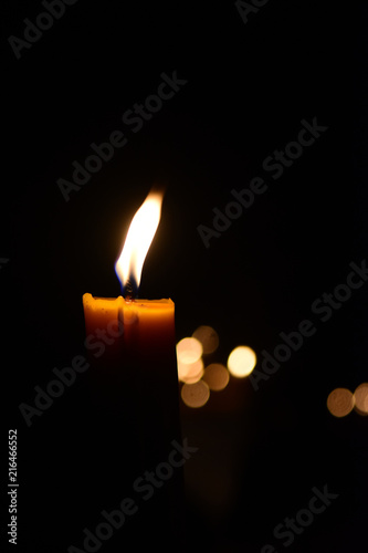 Candles Burning at Night and bokeh background