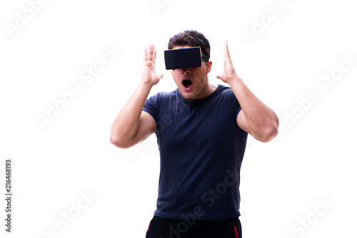Man playing with virtual reality glasses on white background