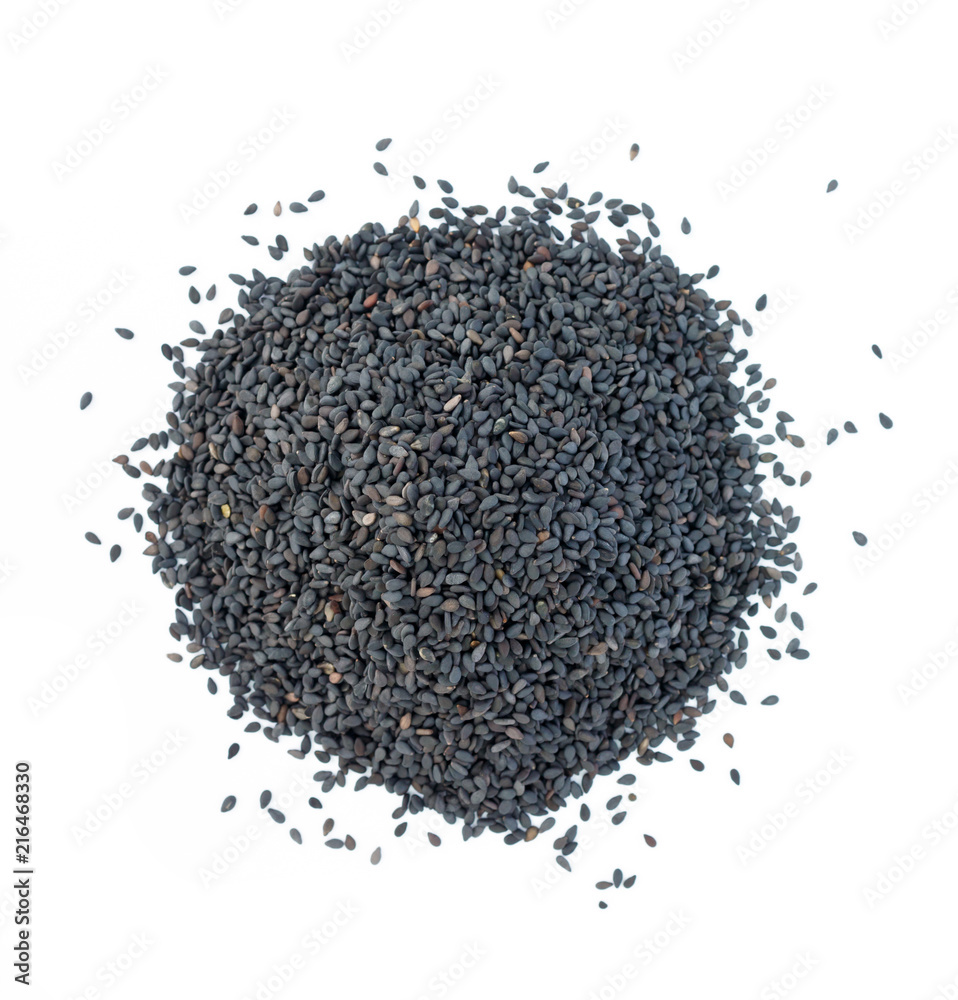 Heap of black sesame on white background. Heap of black sesame on white background.