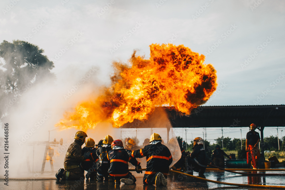 Obraz premium Firefighters in action ,Firefighters training