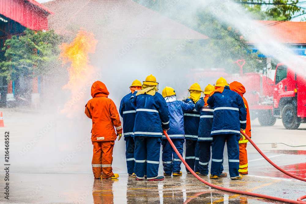 Obraz premium Firefighters in action ,Firefighters training