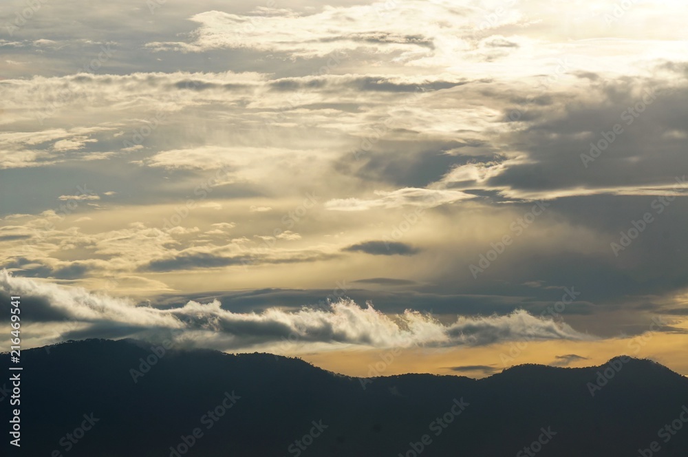 Dramatic cloud, mist, and sun beam when sunrise. Dramatic cloud, mist, and sun beam when sunrise.