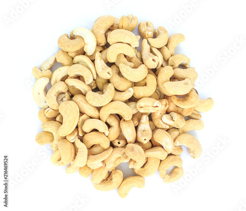 heap cashews top view on white background.