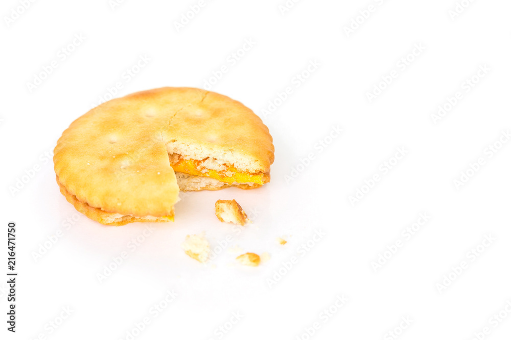 single cracker square broken on white background. single cracker square broken on white background.