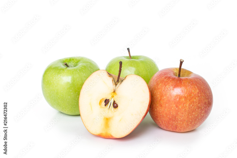 half red apple and green apple on white background.