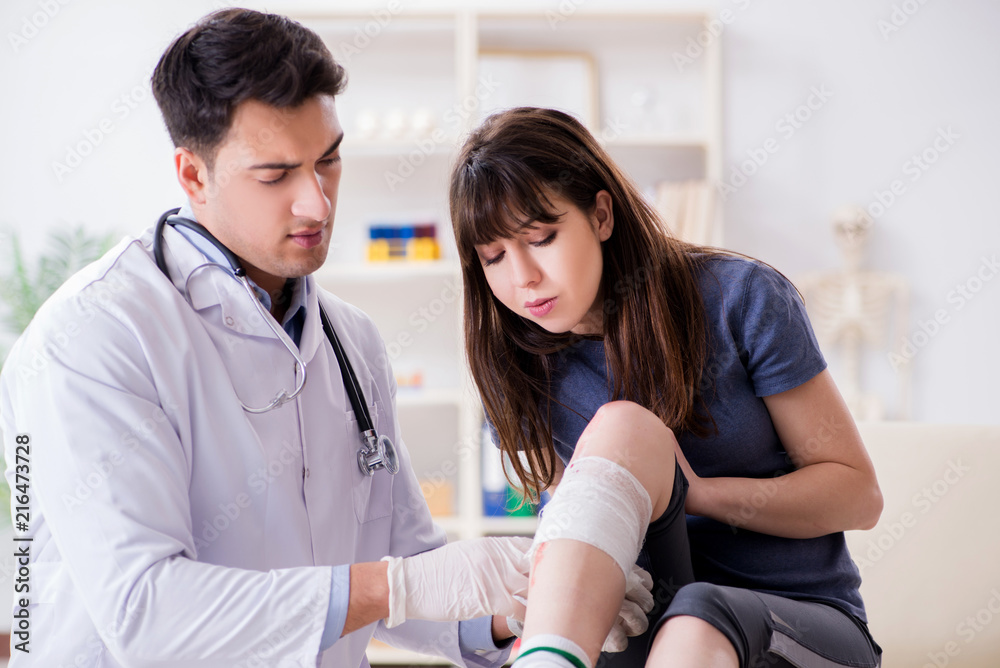 Patient visiting doctor after sustaining sports injury Patient visiting doctor after sustaining sports injury