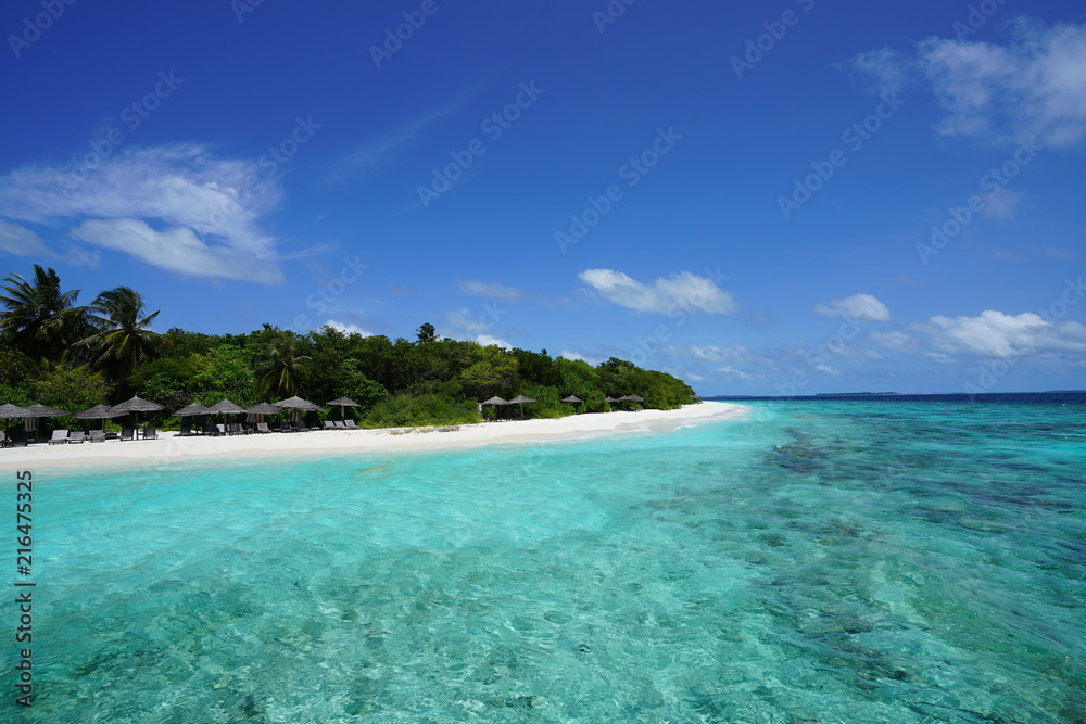 Naklejka premium View of a beautiful beach with turquoise water in Baa Atoll, Maldives