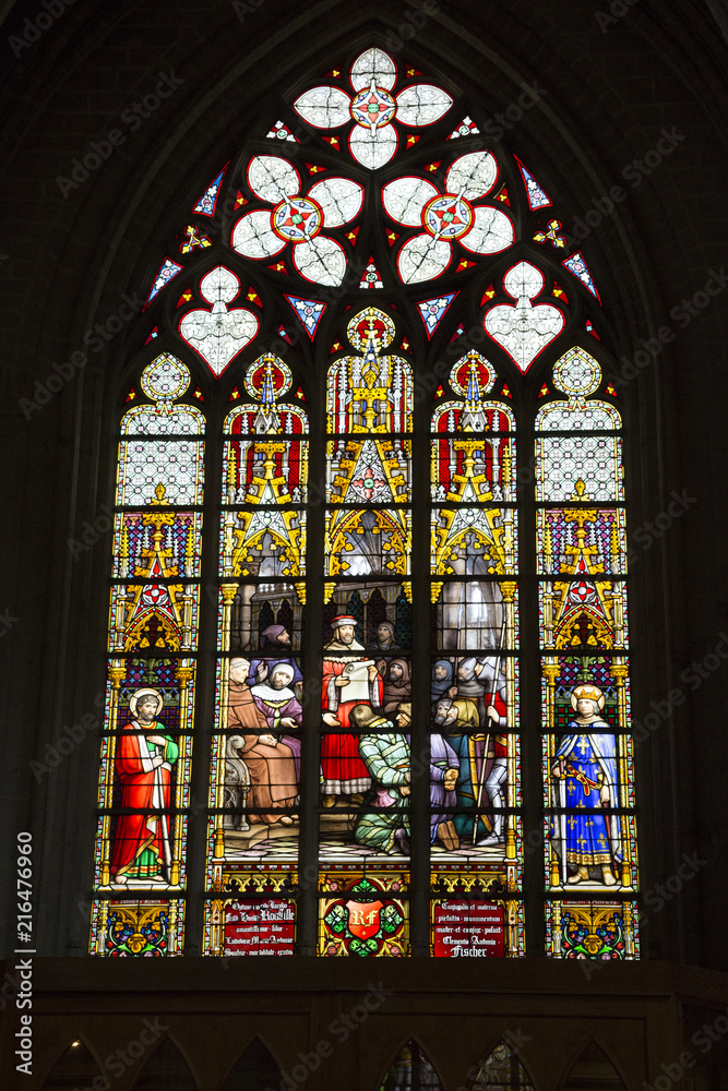 An ancient stained glass window in the Cathedral of St. Michael and St. Gudula