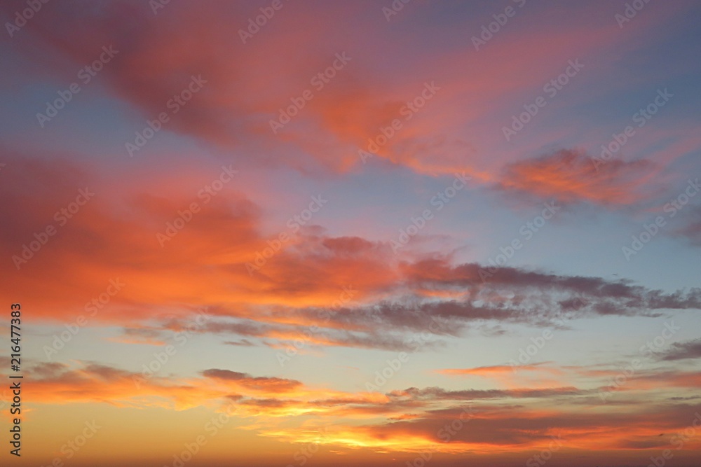 Beautiful orange fiery sunset view in the sky, natural background
