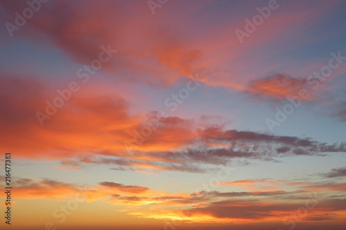 Beautiful orange fiery sunset view in the sky, natural background © natalya2015