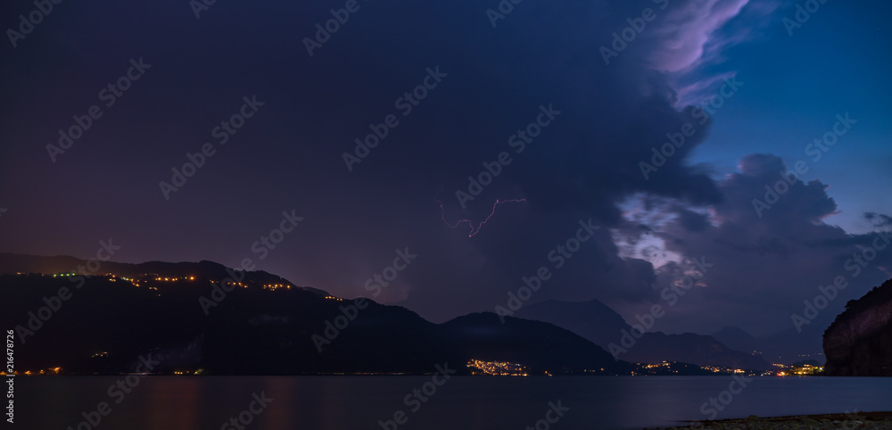 lightning violent storm on the river of the lake como alps beach lightning violent storm on the river of the lake como alps beach