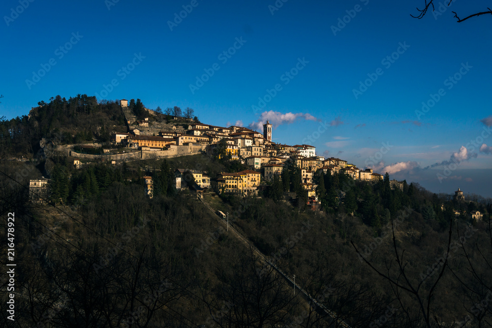 little town in the mountains village old with blue sky isolated