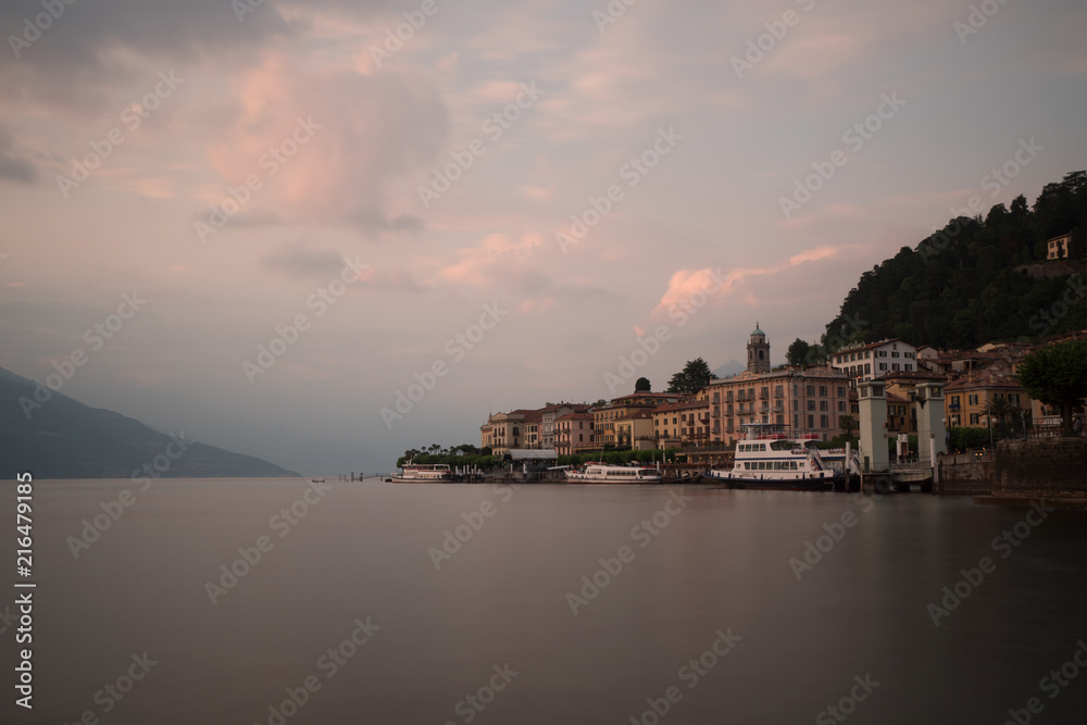 bellagio at sunset long exposure with boat and ferry at cloudy sunset