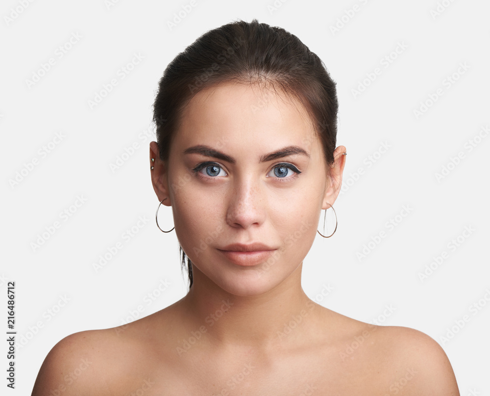 pretty young woman face. Isolated pretty young woman face. Isolated