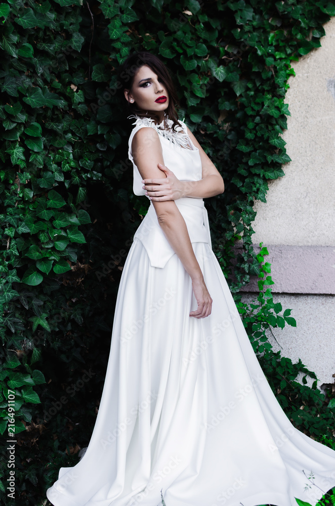 Beautiful girl in long white dress Beautiful girl in long white dress