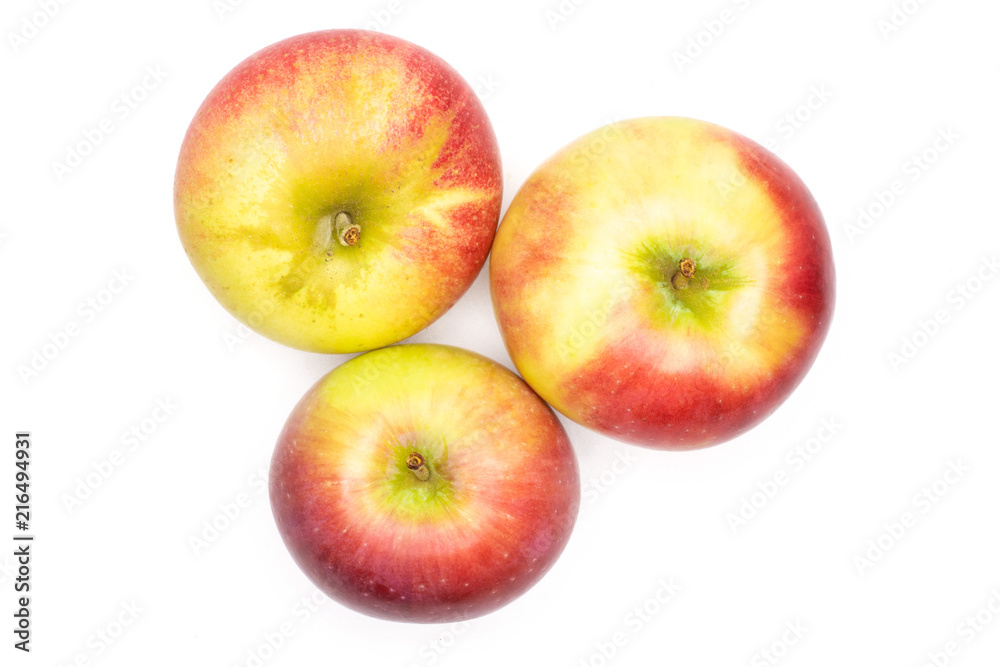 Group of three whole fresh red apple james grieve variety flatlay isolated on white background