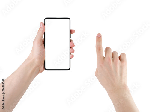 Foto Young man hand holding bezel less smartphone with touch hand isolated on white