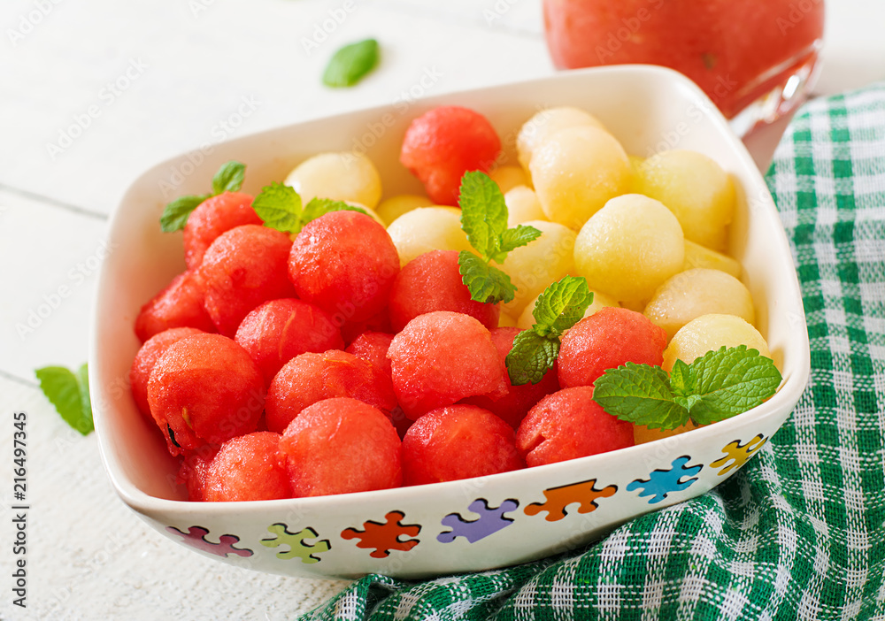 Colorful fruit salad. Watermelon and melon salad. Fresh summer food. Colorful fruit salad. Watermelon and melon salad. Fresh summer food.