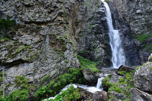 Gveleti Big Waterfalls being in a Dariali Gorge near the Kazbegi city in the mountains of the Caucasus, Geprgia photo