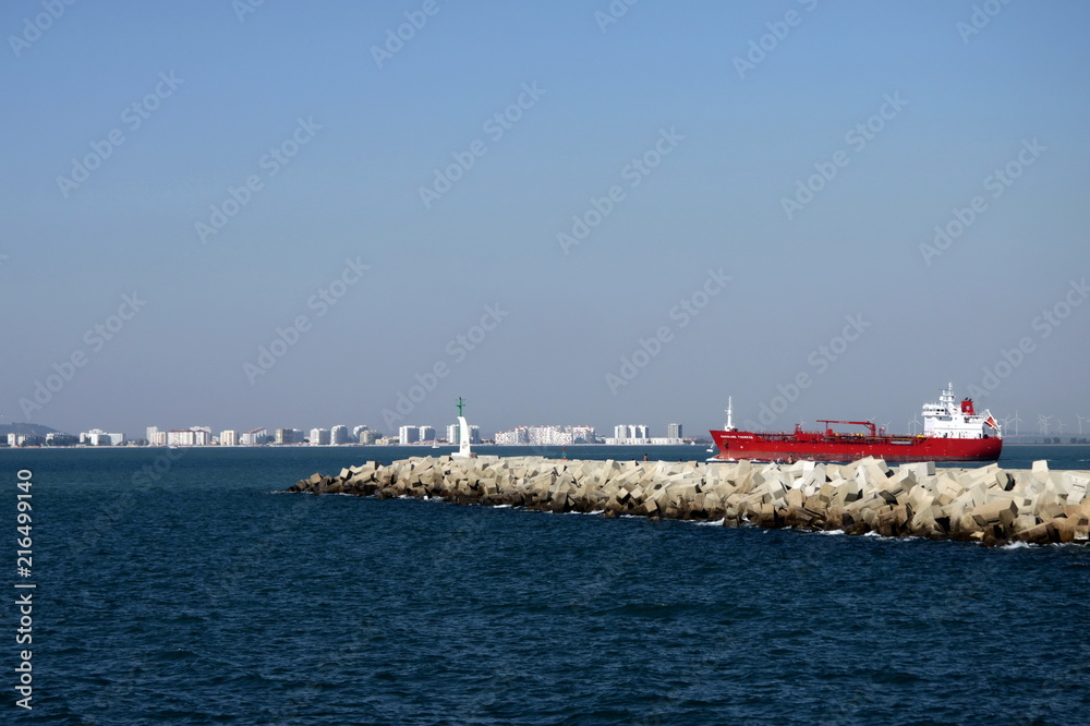  In the harbor of the seaport of Cadiz on the shore of the Cadiz Gulf of the Atlantic Ocean.