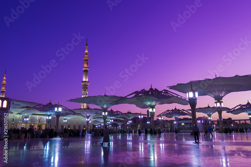 Nabawi mosque during sunrise golden hour. photo