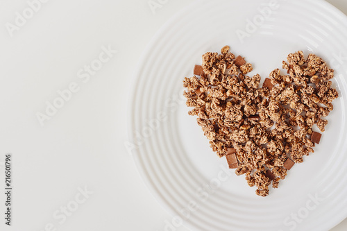 Cereal muesli breakfast on white background. Healthy eating and lifestyle concept