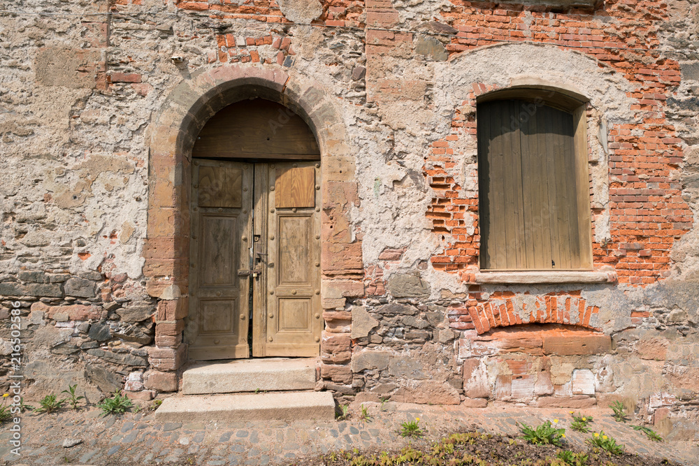 Old architectural details - door and arched entrance Old architectural details - door and arched entrance