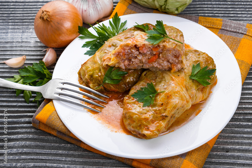 cabbage rolls on a wooden gray rustic background cabbage rolls on a wooden gray rustic background