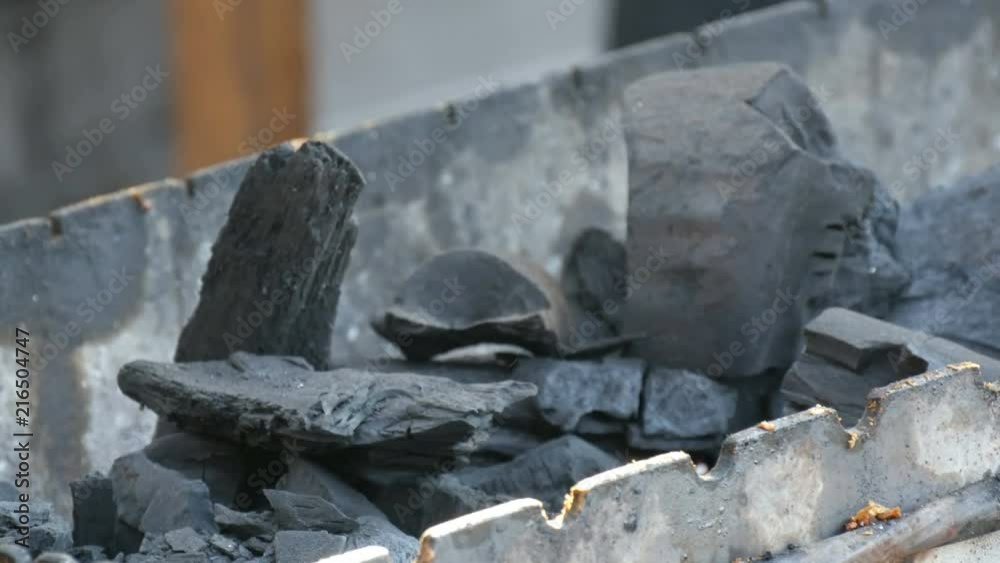 custom made wallpaper toronto digitalLarge pieces of smoking coals lie on the grill