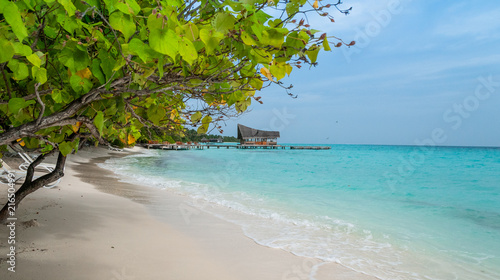 Fototapeta Naklejka Na Ścianę i Meble -  Tropical landscape, water bungalow in a turquoise ocean. Maldives vacation. 