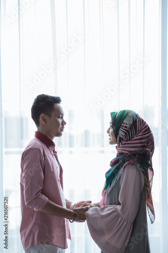 romantic muslim couple holding hands Stock Photo | Adobe Stock