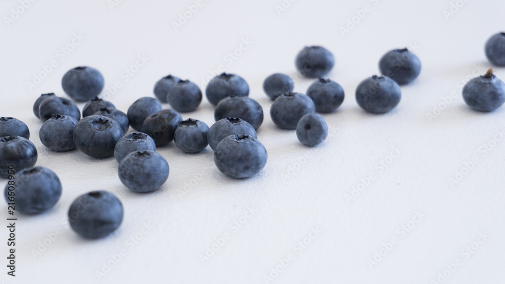 Blueberries and cranberries, berries on a white background. Berry light background. Blueberries and cranberries, berries on a white background. Berry light background.
