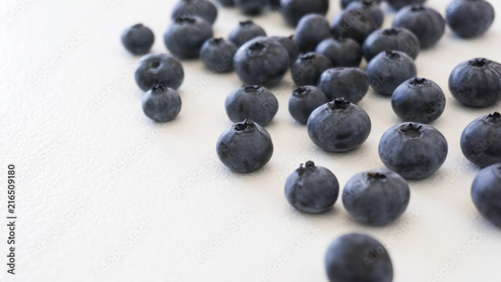 Blueberries and cranberries, berries on a white background. Berry light background. Blueberries and cranberries, berries on a white background. Berry light background.