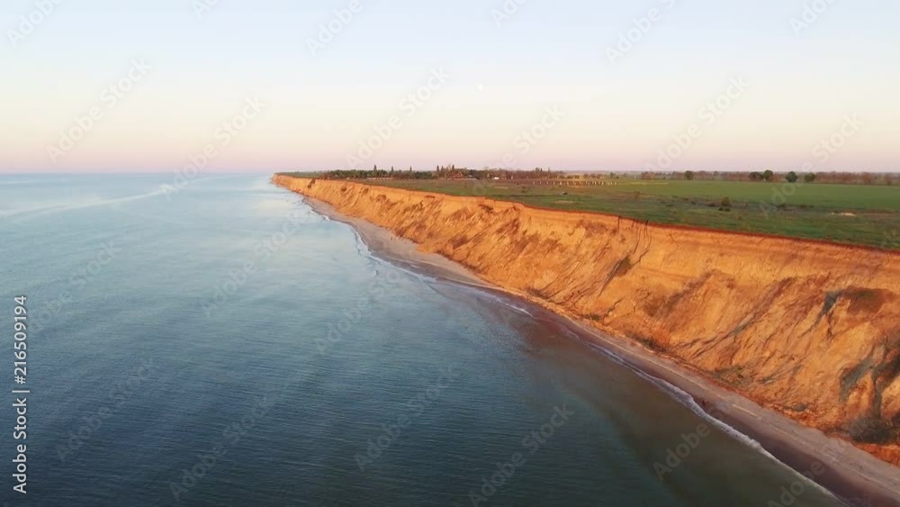 Flying over the sea towards rising sun - Aerial footage video Flying over the sea towards rising sun - Aerial footage video