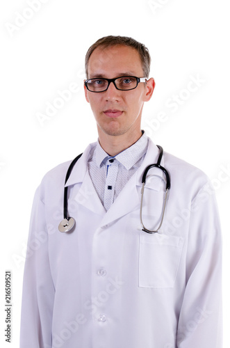 Doctor in glasses and in a dressing gown with a stethoscope on a white background © dimas830