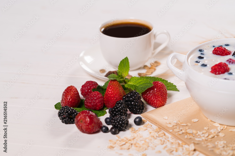 Assorted fresh berries on the breakfast table Assorted fresh berries on the breakfast table